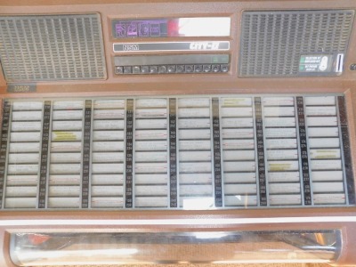 A 1980s NSM City-II juke box, with capacity for eighty 45rpm records and one hundred and sixty tune selections, coin operated, with records and keys, 102cm high, 92cm wide. - 3