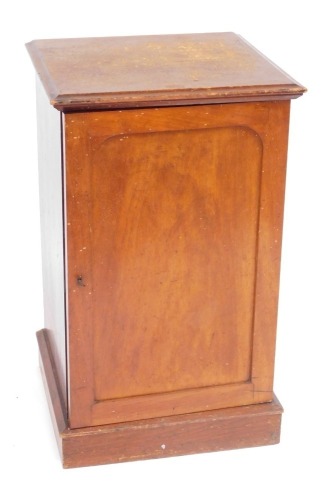 A Victorian mahogany collector's cabinet, the panelled door opening to reveal twelve drawers, each containing specimens of butterflies, moths, beetles, dragonflies and other insects, raised on a plinth base, with key, 87cm high, 52cm wide, 48cm deep.