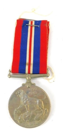 A WWII War Service Medal 1939-45, with ribbon, boxed.