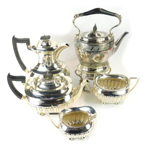 A Walker and Hall four piece silver plated semi fluted tea set, each with ebonised knops, and a Walker and Hall silver plated tea kettle. (5)