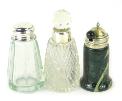 Three items of George V silver ware, comprising a scent bottle and stopper, with rubbed hallmarks, a green serpentine mustard pot with spoon, and a dressing table jar, London 1920. (3)