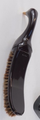 A mid century Bakelite Dandy Duck form clothes brush, 29cm high. - 2