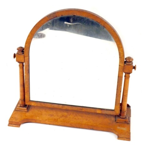 A Victorian burr walnut dressing table mirror, the arched top with walnut inlay, on shaped foot, 70cm high, 74cm wide, 26cm deep. (AF)