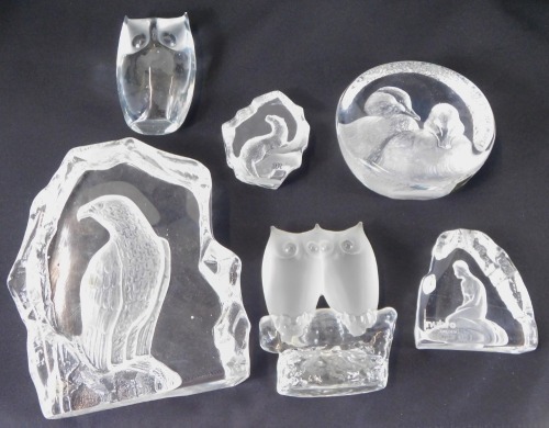 A group of clear and frosted glass paperweights, comprising a Mats Jonasson cameo paperweight decorated with two ducks, Nybro cameo paperweight decorated with a maiden on the rock, Mats Jonasson cameo paperweight of an otter, unmarked cameo paperweight of