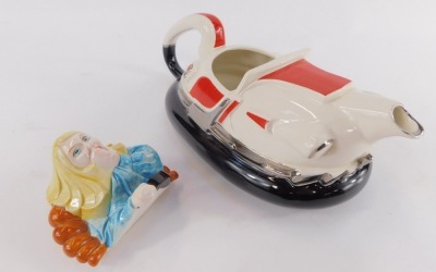 A Silver Crane Company novelty teapot modelled as a dodgem car, with lady driver, printed mark, 29cm wide. - 2