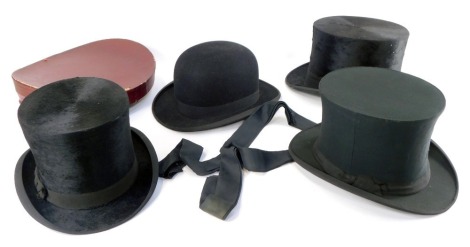 An Army and Navy Cooperative Company black silk top hat, a Mbakers of London opera hat, boxed, Dunn and Company of London black silk top hat, and a City Cork Hat Company bowler hat, size 6&#8542?. (4)