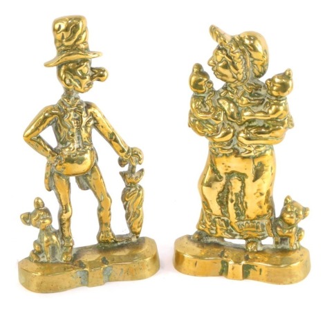 A pair of Victorian brass door stops, modelled as Ally Sloper and Mrs Sloper with babies, 27.5cm and 26cm high respectively.