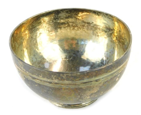 A George V hammered sugar bowl, on a stepped foot, maker SB&S Limited, Birmingham 1930, 6.32oz.