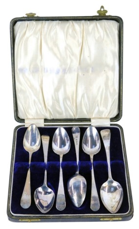 A matched set of six George III and later silver teaspoons, each with Old English, bearing initials or monograms, 2.5oz, cased.