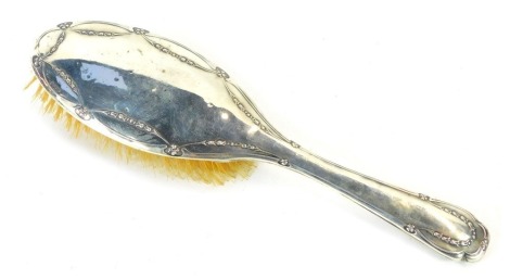 A George V silver backed dressing table brush, with Neoclassical design, Chester 1922.