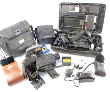 A Kodak No A116 camera, leather cased, together with a Panasonic VHS-C movie camera, NV-MC30, together with accessories, cased, a Sankyo Sound Excel - 300S cine camera, other cameras, etc. (a quantity)