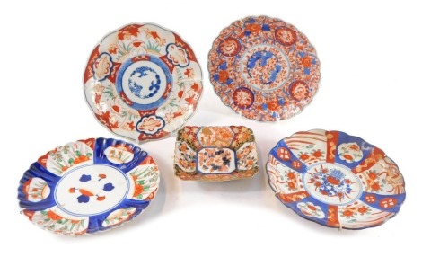 Five Chinese and Japanese Imari dishes, variously decorated.