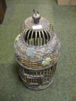 A bamboo bird cage.