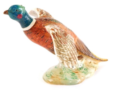 A Beswick pottery figure of a pheasant, number 850, printed and impressed marks.