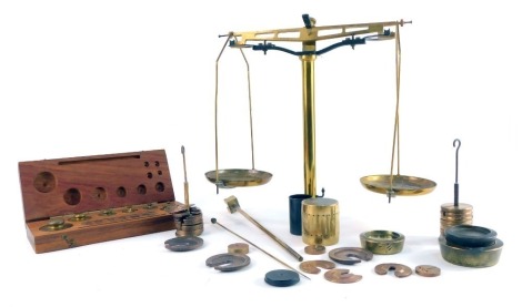 A set of early 20thC Philip Harris Limited brass and cast iron balance scales, together with various weights, and a box containing assorted weights.