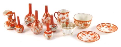 A group of Japanese Kutani porcelain vases, jugs, and bowls. (a quantity)