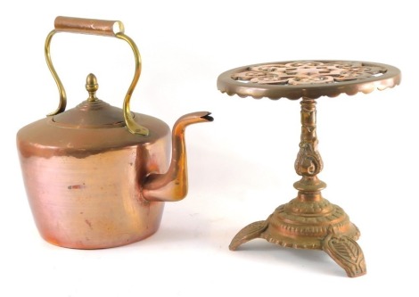 A Victorian copper and brass kettle, together with a Victorian brass and cast iron kettle stand, 25cm high.