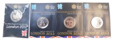 Three Royal Mint Countdown to London 2012 Olympics five pound coins 2011, together with a Royal Mint The Official Olympic five pound coin celebrating London 2012. (4)