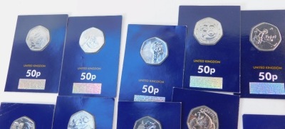 A collection of fifty pence coins, including Peace Prosperity and Friendship, The Snowman, Piglet, Paddington Bear, The Gruffalo, Beatrix Potter, and Wallace and Gromit. - 5