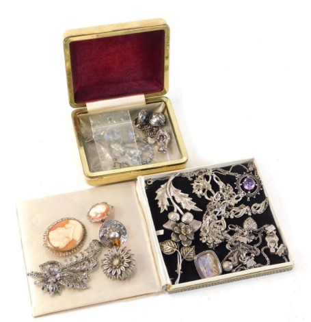 Victorian and later silver jewellery, to include a marcasite set floral brooch and necklace, a lady's Albert chain, Scottish thistle brooch, butterfly brooches, cameo brooches and a charm bracelet. (a quantity)