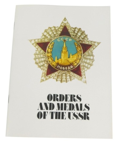 A copy of The Orders and Medals of the USSR, coloured catalogue with forty pages printed in 1944.