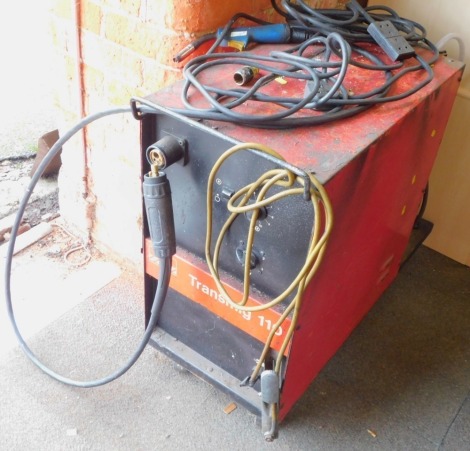 A Transmig 110 welder, with accessories.