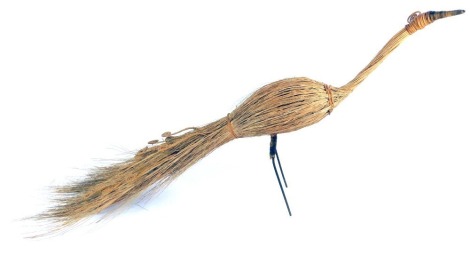 A wicker figure of a peacock, 124cm wide.