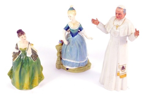 A Royal Doulton figure modelled as Fleur, HN2368, another modelled as Clarinda, HN2724, and a figure of his Holiness Pope John Paul II, HN2888. (3)