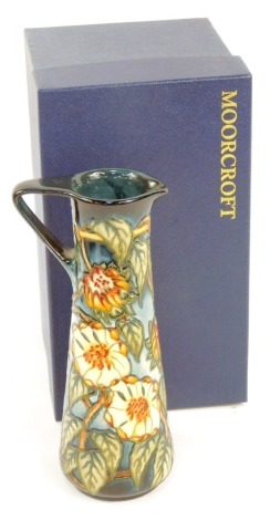 A Moorcroft Pottery jug decorated in the Sonoyta pattern, designed by Kerry Goodwin, signed, limited edition 117/400, painted and impressed marks, 24cm high, boxed.