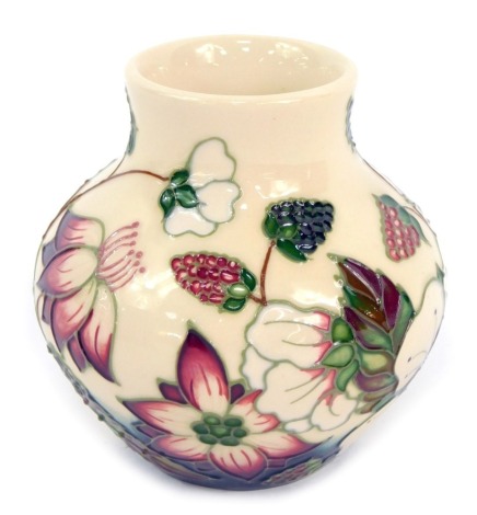 A Moorcroft Pottery vase decorated in the Bramble pattern, impressed and painted marks, 8cm high, boxed.