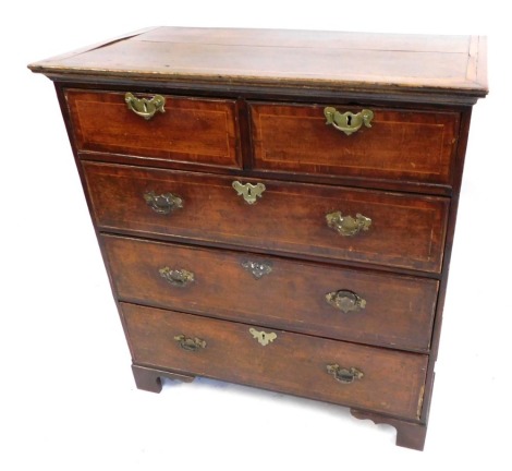 A George III oak and mahogany cross banded chest, of two short and three long drawers, with brass escutcheons and swing handles, on bracket feet, 102cm high, 96cm wide, 53cm deep.