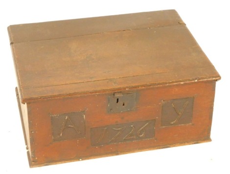 An 18thC oak bible box, with three plank top inscribed A Y 1726, 25cm high, 59cm wide, 46cm deep. (AF)