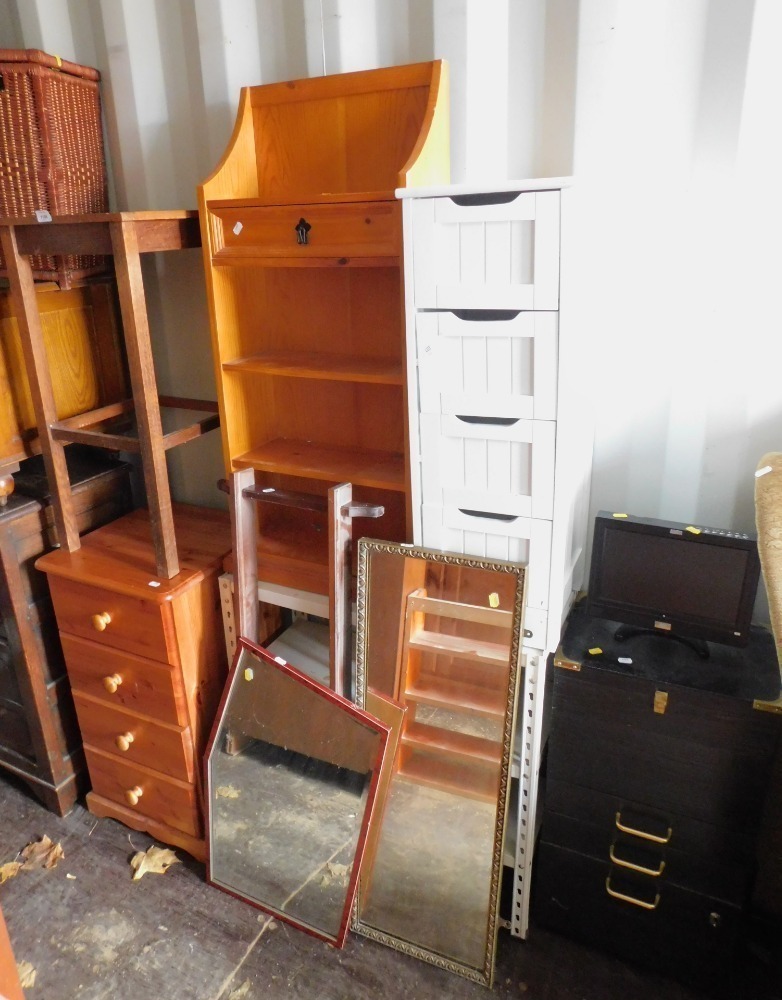 A pine chest of four drawers, oak side table, bookcase, mirrors, plate