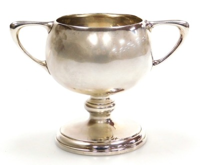 An Edwardian VII silver trophy, the bowl of circular form with angular handles, on a circular foot, James Dixon and Sons Ltd., Sheffield 1909, 7.59oz, 12.5cm high. - 3