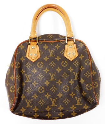 A Louis Vuitton monogram canvas Manhattan PM bag, the front with two compartments with brass monogrammed push lock clasps, the main body with a central zip enclosing a suede fitted interior, serial number FL0045, 25cm high, 25cm wide, 7cm deep, with cloth - 10