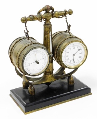 A 19thC brass nautical related combination clock and barometer, modelled in the form of a ship's anchor and two barrels, the enamel clock dial bearing Roman numerals and a subsidiary seconds dial, key wind, the centre with a mercury filled thermometer, ra - 4