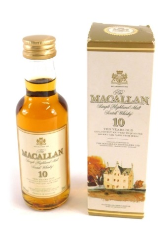 A miniature bottle of the Macallan single Highland malt Scotch whisky ten year old, 50ml, in outer card case.