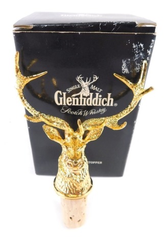 A boxed Glenfiddich stag head bottle stopper, 11cm high, boxed.