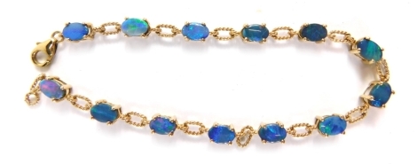 A 9ct gold opal bracelet, set with thirteen opal doublets, in a raised basket setting, with twist links, 19cm long, yellow metal stamped 9kt, 4.9g all in.