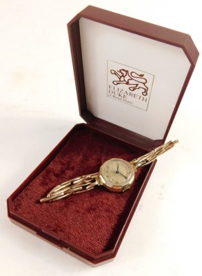 A 9ct gold cased cocktail watch, with 1.5cm Arabic dial and fifteen jewel movement, with elasticated plated bracelet, 14g all in, in associated box. - 3