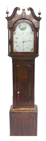 H. Fletcher, Rotherham. A 19thC oak and mahogany longcase clock, the 31cm wide arch dial with painted spandrels, thirty hour movement, in a swan neck pedimented case with shell inlay and orb finial, above a shaped trunk door with further shell patera, 216