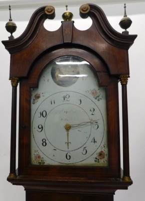 H. Fletcher, Rotherham. A 19thC oak and mahogany longcase clock, the 31cm wide arch dial with painted spandrels, thirty hour movement, in a swan neck pedimented case with shell inlay and orb finial, above a shaped trunk door with further shell patera, 216 - 2