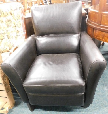 A black leatherette armchair, on ebonised legs.