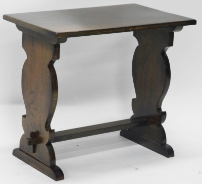 An oak magazine rack, in the manner of Titchmarsh and Goodwin, with rectangular table top, 49cm wide, an oak coffee table, and an oak occasional table. (3) - 2