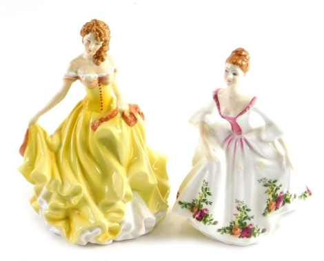 Two Royal Doulton figures, comprising Country Rose HN3221, 18cm high, and Pretty Ladies Summer, printed marks beneath. (2)