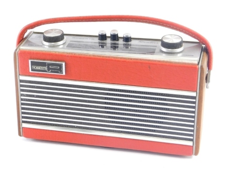 A vintage Roberts Rambler radio, in part wooden casing, 21cm wide.