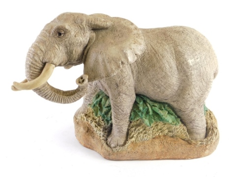 A 20thC Animal Classics pottery elephant figure, CC-112, labelled beneath, 26cm high.