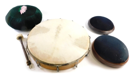 Various footstools, and a circular bodhran drum with beater, 45cm diameter.