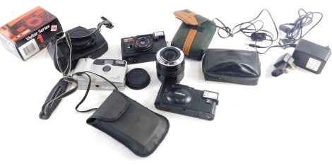 Various cameras and related items, a Canon EOS 650 camera, 13cm high, a Sigma lens 1:3.5-4.5 f=28-70mm, Miranda case, various other related items. (a quantity)