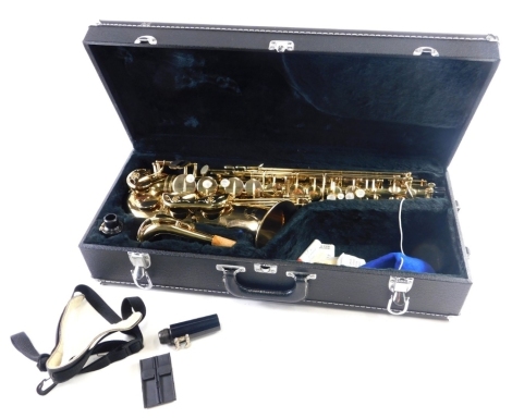 A Dixon Empire Deluxe brass saxophone, with mother of pearl finish buttons, and separate mouth piece, in fitted case, the case 53cm long.